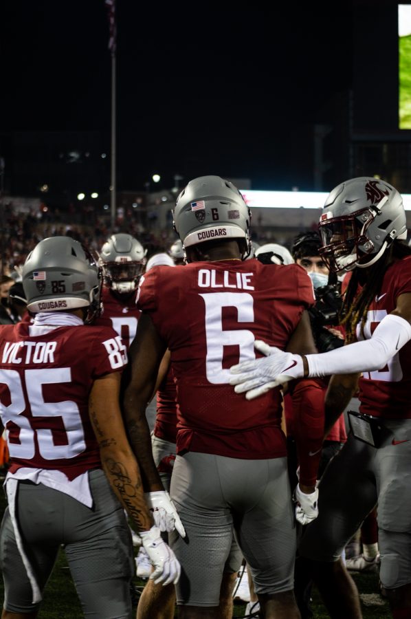 Washington State University wide reciever Donovan Ollie celebrates with his teammates after a touchdown at Martin Stadium in Pullman, Wash., Saturday, Sept. 4, 2021.