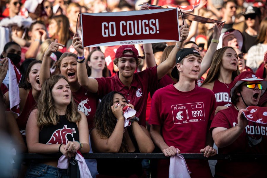 A WSU fan displays a Go Cougs sign during a Sept. 11 game in Martin Stadium.