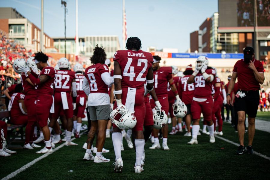 WSU defesnive back Halid Djibril stands on the sideline with teammates during a Sept. 11 game against Portland State in Martin Stadium.