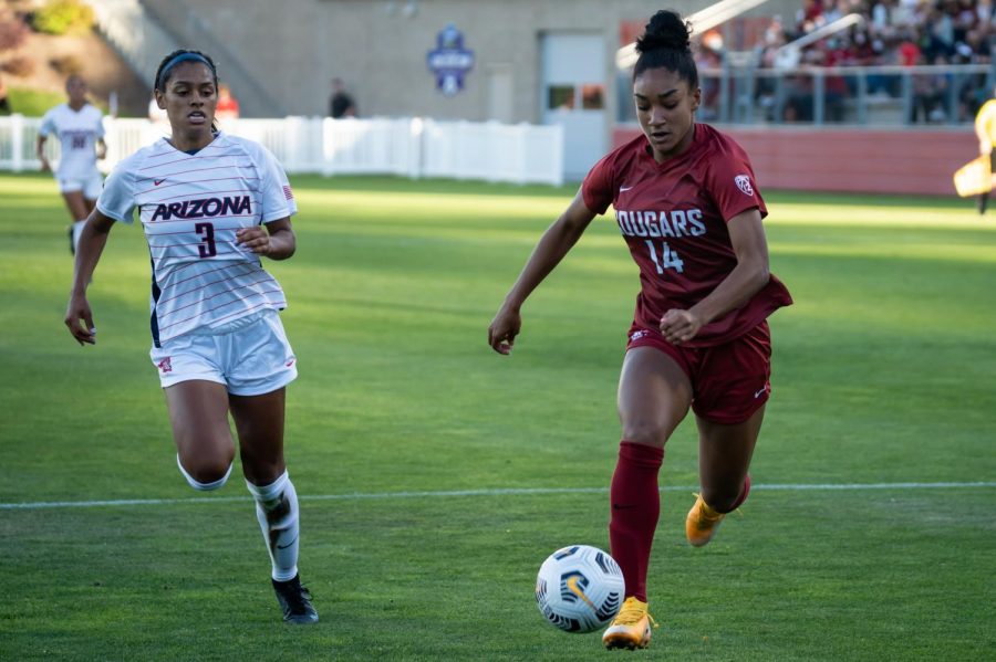 WSU forward Margie Detrizio runs after the ball during the first half of a match Sept. 24 in Pullman.