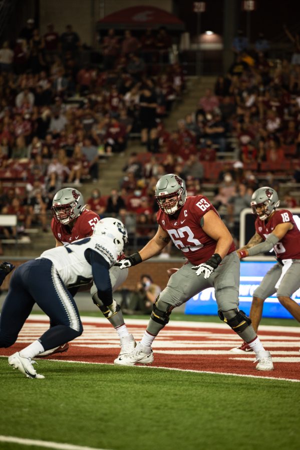Washington State University offensive lineman Liam Ryan prepares for a block on the goal line against a Utah State player at Martin Stadium in Pullman, Wash., Saturday, Sept. 4, 2021.