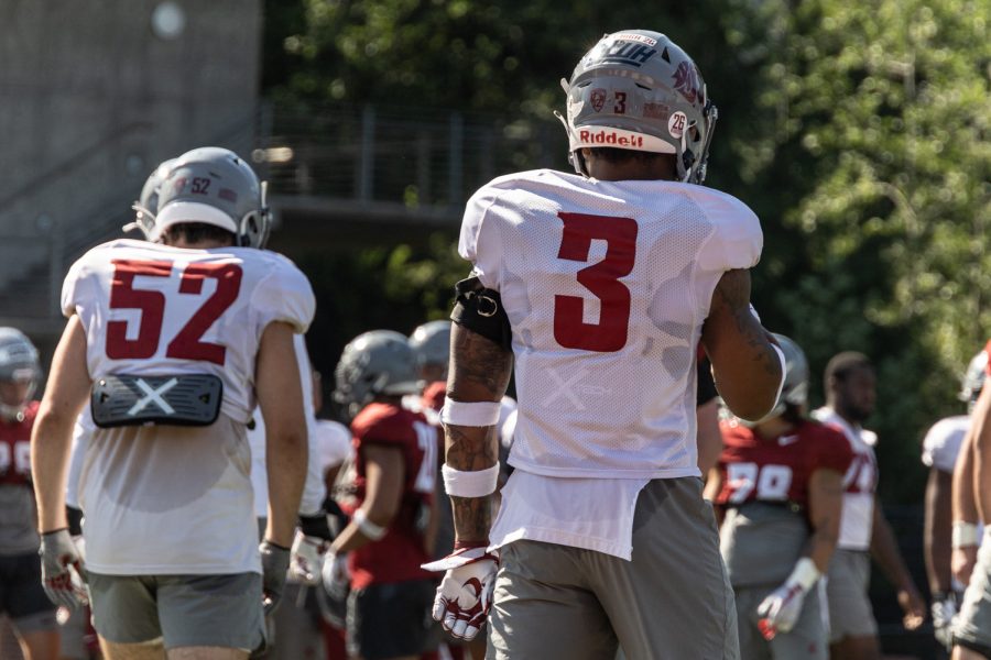 Redshirt sophomore linebacker Kyle Thornton and fifth-year cornerback Daniel Isom take reps during an Aug. 16 practice on Rogers Field in Pullman. Isom is set to start at strong safety, while Thornton will back up fifth-year senior Jahad Woods to open the 2021 season.