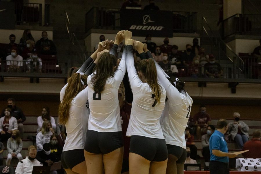 WSU volleyball celebrates a point against the Gonzaga Bulldogs on Sept. 10, 2021, inside Bohler Gym.