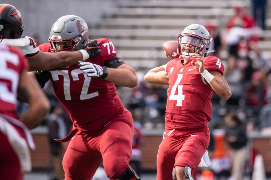 WSU+quarterback+Jayden+de+Laura+%284%29+throws+the+ball+downfield+during+a+college+football+game+Oct.+9+at+Martin+Stadium+in+Pullman.