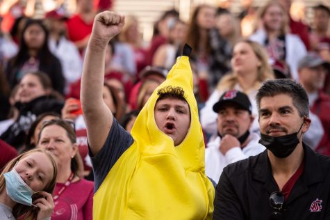 WSU Banana Guy Matti Tenney cheers on the Washington State University football team at Martin Stadium, Saturday, Oct. 16, 2021, in Pullman.