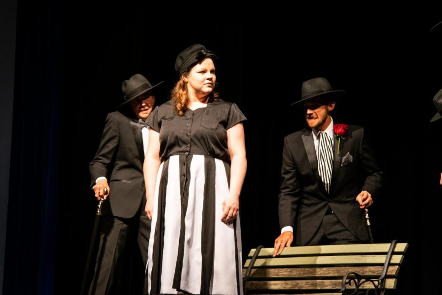Multiple Hydes creep toward the character of Elizabath Jelkes on opening night of Dr. Jekyll & Mr. Hyde at the Gladish Community & Cultural Cener.