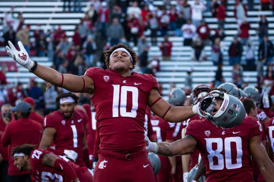 Washington State University defensive edge Ron Stone Jr. (10) celebrates a win after a college football game at Martin Stadium, Saturday, Oct. 9, 2021, in Pullman, Wash.