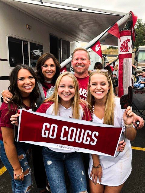 The Waage family is  pictured here tailgating before a WSU football game, which the family did often when their daughters were growing up. 