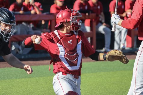 WSU catcher Matt Erickson throws the ball back to the pitcher during a scrimmage on Oct. 18, 2021, in Pullman.