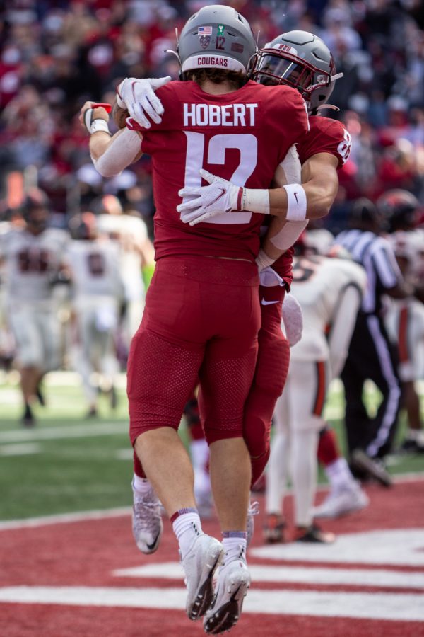 Washington State University wide reciever Joey Hobert (12) celebrates a touchdown during a college football game at Martin Stadium, Saturday, Oct. 9, 2021, in Pullman, Wash.