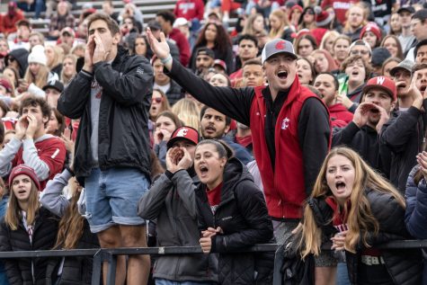 WSU students cheer on the football team during the second half of a college football game on Oct. 23, 2021, at Martin Stadium.