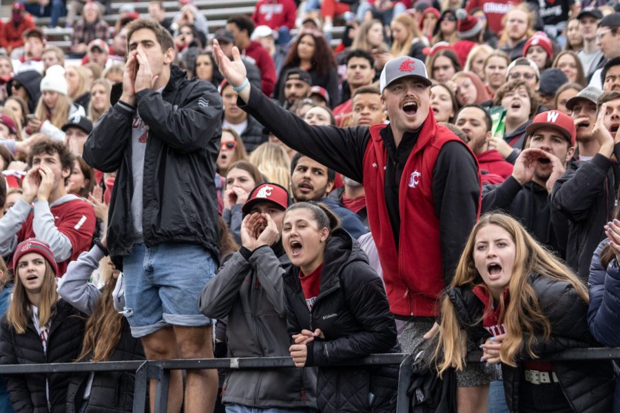 WSU+students+cheer+on+the+football+team+during+the+second+half+of+a+college+football+game+on+Oct.+23%2C+2021%2C+at+Martin+Stadium.