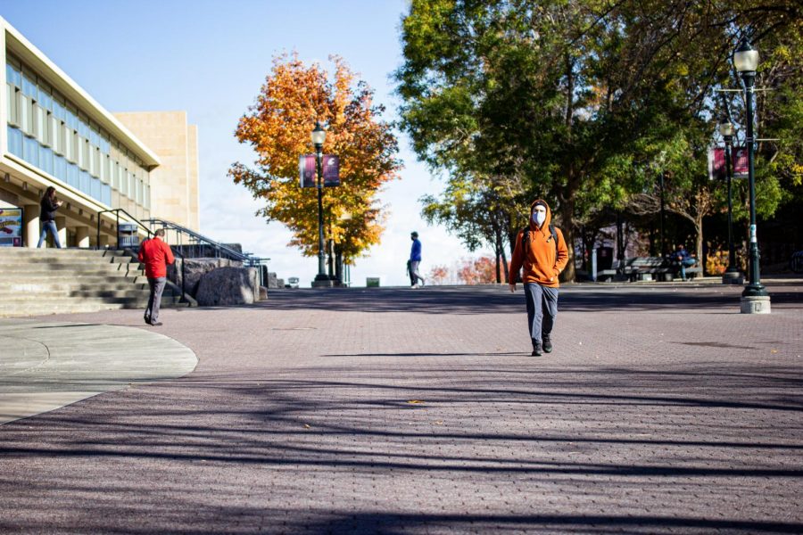 Students walk across Glenn Terrell Mall, where different campus groups often table or hold demonstrations.