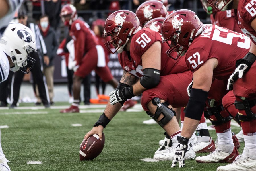 The WSU offensive line prepares to battle the BYU defensive line during the second half of a college football game on Oct. 23, 2021, at Martin Stadium in Pullman.