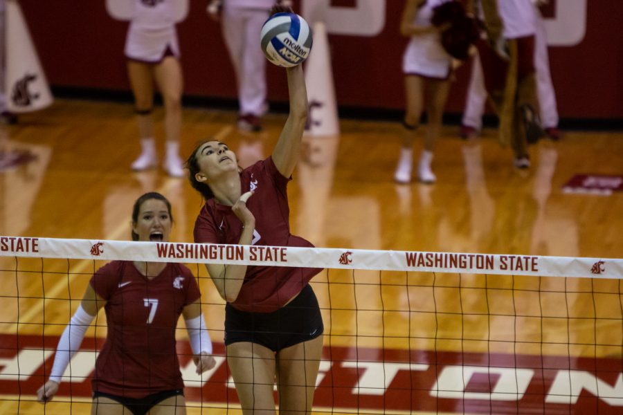 Washington State University (position) (name) spikes the ball during a college volleyball match against the University of California, Sunday, Oct. 24, 2021, in Pullman, Wash.