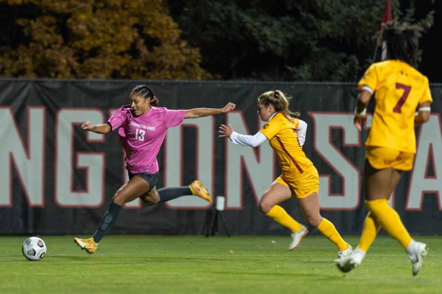WSU forward Elyse Bennett (13) shoots on goal during a college soccer match against USC on Oct. 21, 2021, in Pullman.