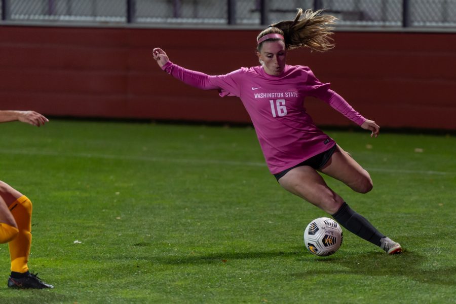 WSU forward Alyssa Gray (16) dribbles the ball during a college soccer match against USC on Oct. 21, 2021, in Pullman.