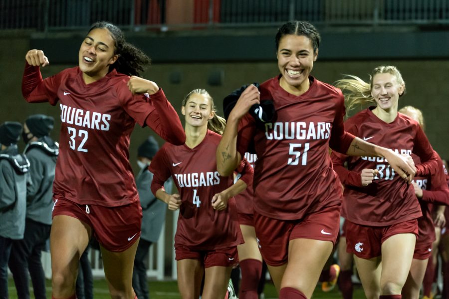 The WSU Womens Soccer team runs out of the locker room before playing against the University of Montana in the NCAA Tournament at the Lower Soccer Field, Saturday, Nov. 13, 2021.