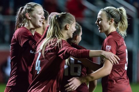 WSU forward Grayson Lynch (4) celebrates with her teammates after scoring a goal against the University of Montana in the second half of an NCAA Tournament match at the Lower Soccer Field on Nov. 13, 2021, in Pullman.