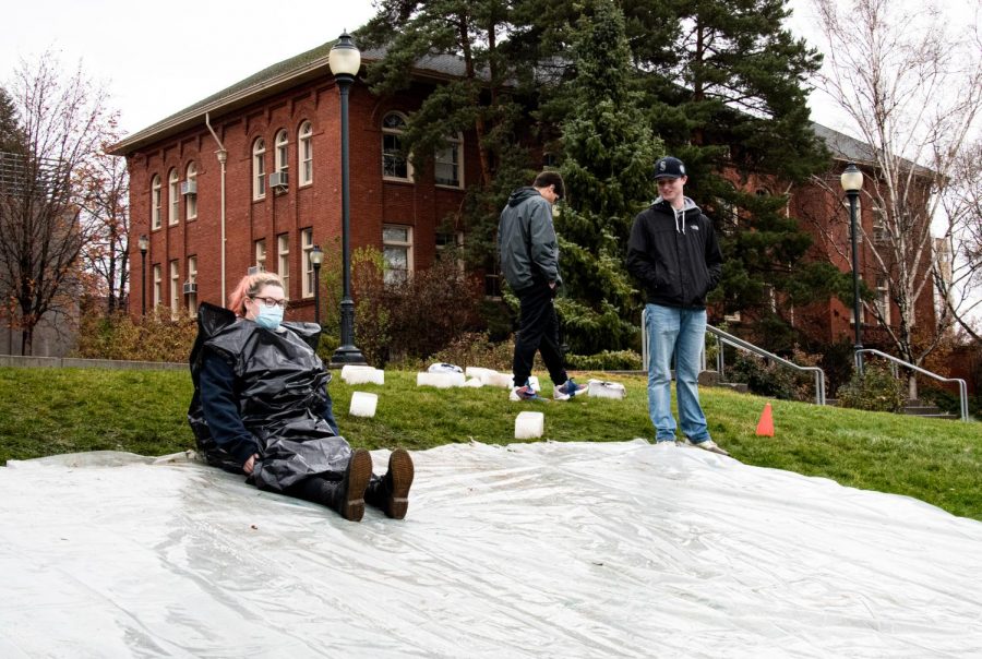Delaney Brown slides down Thompson Flats at the Frozen Friday event, Friday, Nov. 12, 2021, in Pullman.