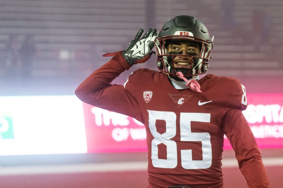 WSU wide receiver Lincoln Victor (85) hypes up the crowd after a kickoff during a college football game against the University of Arizona at Martin Stadium, Friday, Nov. 19, 2021, in Pullman, Wash.