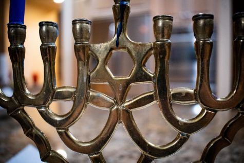 The Star of David represents the Jewish religion and culture and is often featured on menorahs and hanukkiahs.