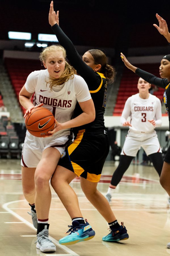 WSU guard Tara Wallack (1) dribbles towards the hoop during a college basketball game against San Jose State University, Tuesday, Nov. 9, 2021, in Pullman.