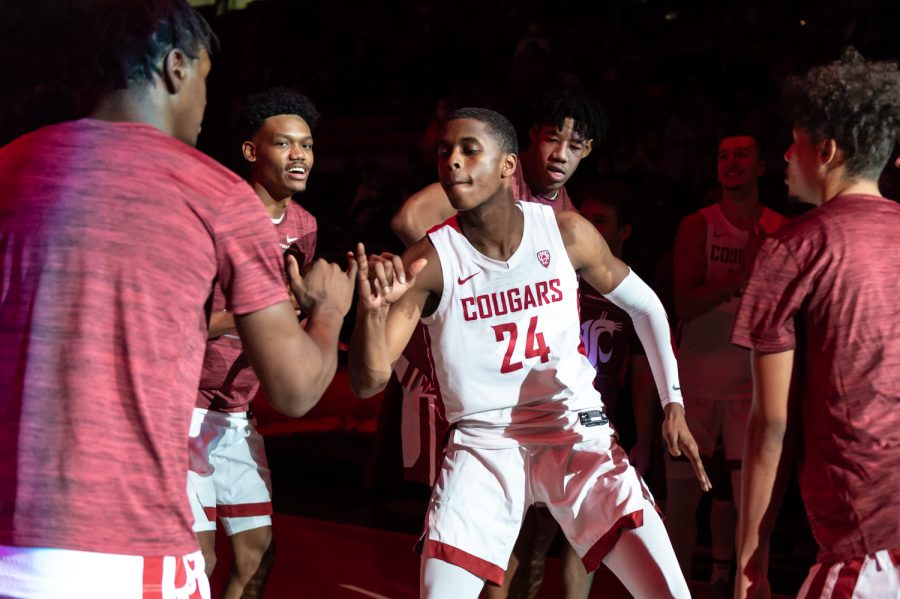WSU guard Noah Williams (24) makes his entrance before a college basketball game against Seattle University at Beasley Coliseum, Friday, Nov. 12, 2021, in Pullman.