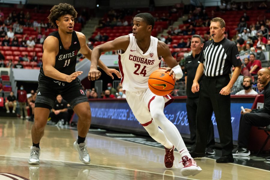 WSU+guard+Noah+Williams+%2824%29+dribbles+the+ball+past+Seattle+University+guard+Riley+Grigsby+%2811%29+during+a+college+basketball+game+at+Beasley+Coliseum%2C+Friday%2C+Nov.+12%2C+2021%2C+in+Pullman.