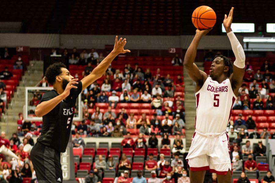 WSU guard TJ Bamba shoots a three-pointer during a college basketball game against Seattle University at Beasley Coliseum, Friday, Nov. 12, 2021, in Pullman.