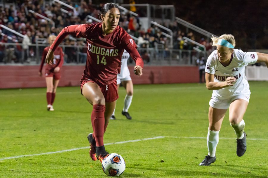 WSU forward Margie Detrizio (14) attempts to score a goal during an NCAA Tournament match against the University of Montana at Lower Soccer Field, Saturday, Nov. 13, 2021, in Pullman.