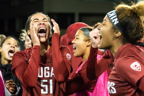 WSU defender Kelis Barton celebrates with her teammates after defeating the University of Montana 3-0 in an NCAA Tournament match at Lower Soccer Field, Saturday, Nov. 13, 2021, in Pullman.