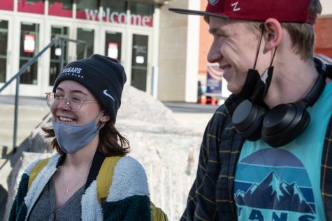 Sophmore education majors Emilee Rodriguez (left) and Conner Crosby (right) share their thoughts on the worst Thanksgiving dish on Nov. 16 in front of the Compton Union Building in Pullman. 