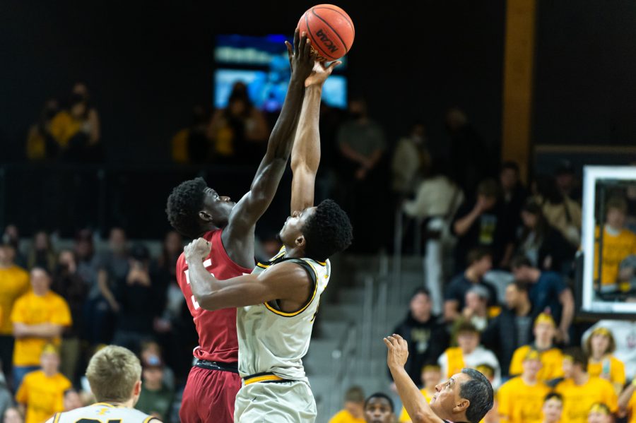 WSU forward Mouhamed Gueye (35) competes for the tip-off at the start of a college basketball game against the University of Idaho, Thursday, Nov. 18, 2021, in Moscow, Idaho.