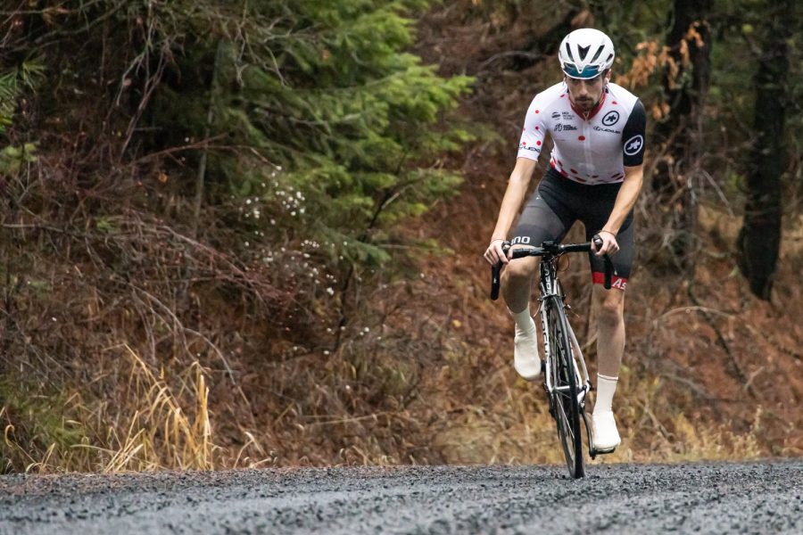 Cyclist Chris Acosta climbs up Blaine Road, Tuesday, Nov. 30, 2021, near Moscow, Idaho.