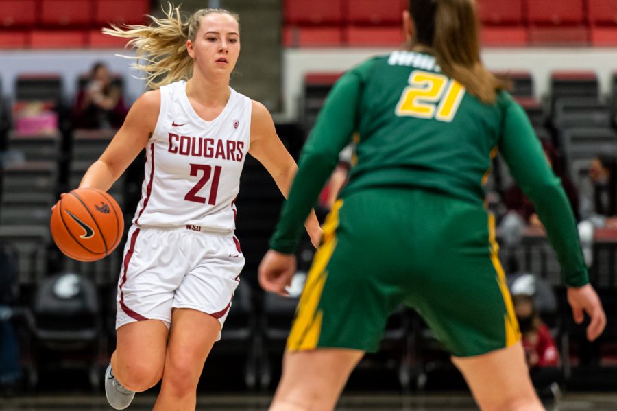WSU+guard+Johanna+Teder+%2821%29+dribbles+the+ball+towards+the+basket+during+a+college+basketball+game+against+the+University+of+San+Francisco+in+Beasley+Coliseum%2C+Dec.+3%2C+2021.