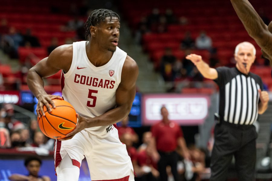 WSU+guard+TJ+Bamba+%285%29+looks+for+someone+to+pass+the+ball+to+during+a+college+basketball+game+against+Weber+State+University+at+Beasley+Coliseum%2C+Wednesday%2C+Dec.+8%2C+2021.
