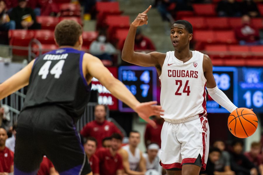 WSU guard Noah Williams (24) instructs his teammates during a college basketball game against Weber State University at Beasley Coliseum, Wednesday, Dec. 8, 2021.