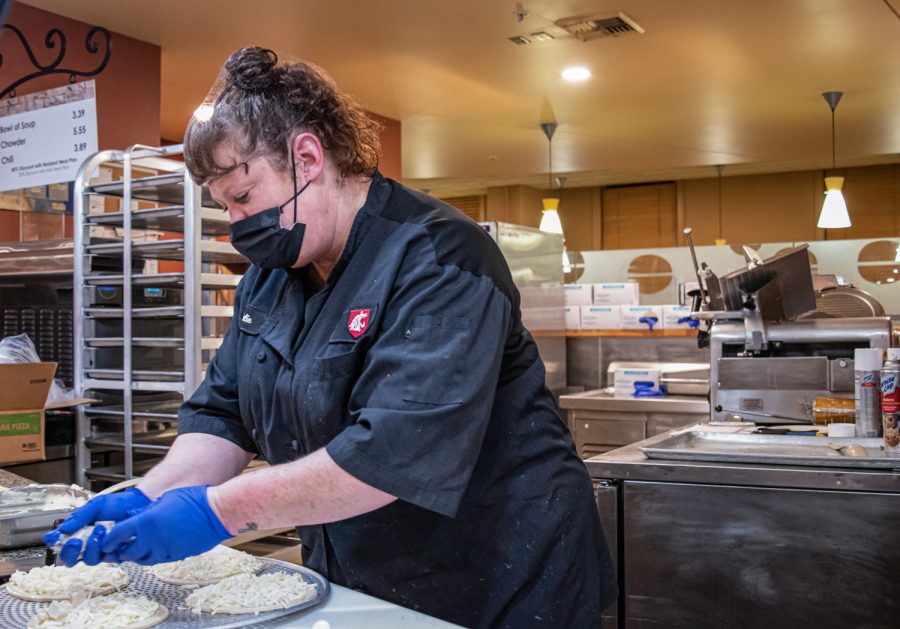 Chef Julie Sparks makes pizza at Hillside Café, Wednesday, Dec. 1, 2021.