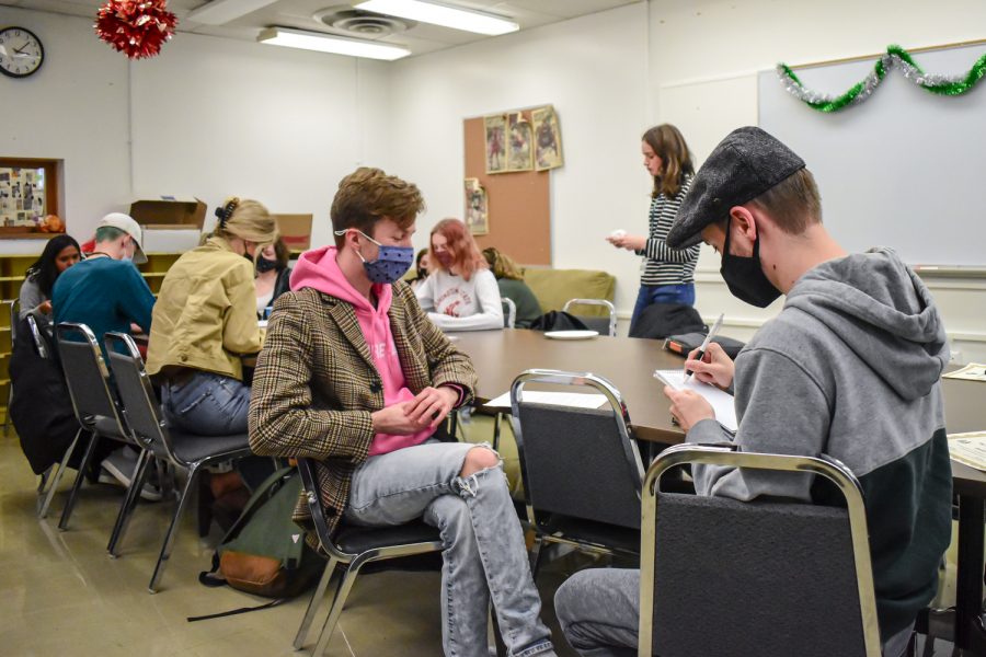Evergreen reporter Alex McCollum, left, plays a character during an interview with Evergreen reporter Josiah Pike during a workshop Sunday afternoon in Murrow Hall.