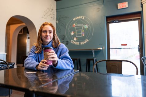 WSU student Alissa Carreno enjoys her coffee at Mannys Coffee House, Wednesday, Dec. 1, 2021, in Pullman.