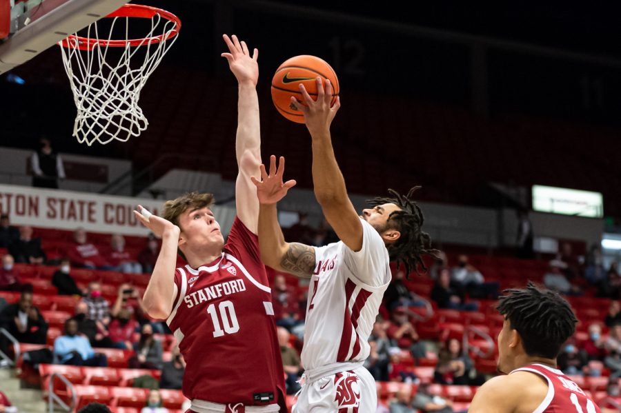Stanford+University+forward+Max+Murrell+%2810%29+attempts+to+block+a+layup+by+WSU+guard+Michael+Flowers+%2812%29+during+the+first+half+of+an+NCAA+college+basketball+game%2C+Thursday%2C+Jan.+13%2C+in+Beasley+Coliseum.