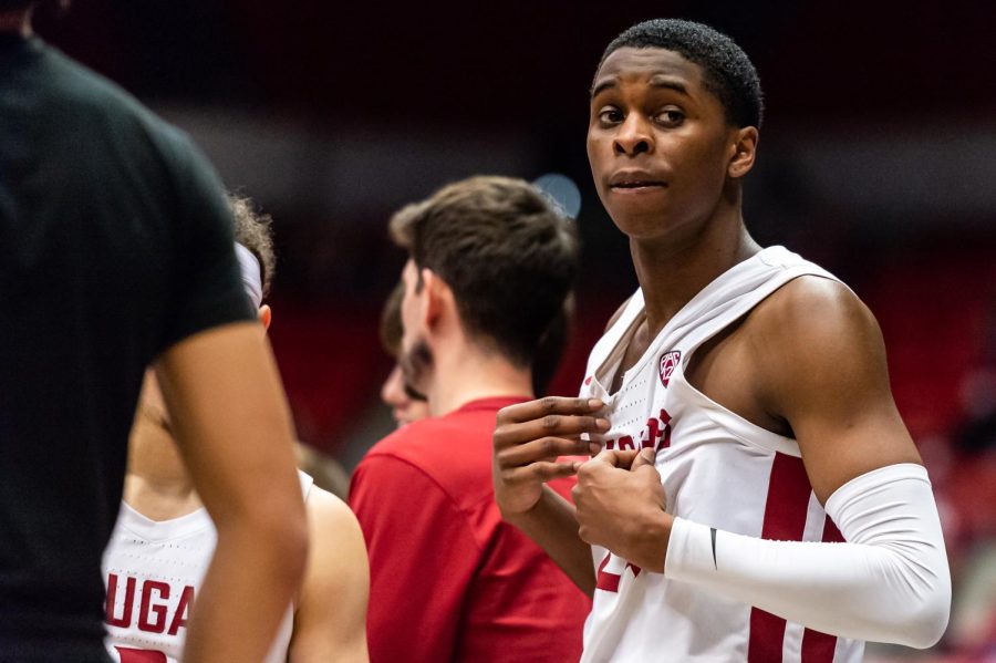 WSU guard Noah Williams (right) looks at the crowd during a timeout in the second half of an NCAA college basketball game against California, Saturday, Jan. 15, in Beasley Coliseum.