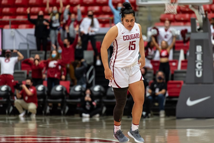 WSU+forward+Ula+Motuga+%2815%29+drops+back+after+shooting+a+3-pointer+during+the+second+half+of+an+NCAA+collegiate+basketball+game%2C+Jan.+28%2C+in+Beasley+Coliseum.+Motuga+tied+the+game+with+14+seconds+left+in+the+fourth+quarter%2C+sending+the+game+into+overtime.