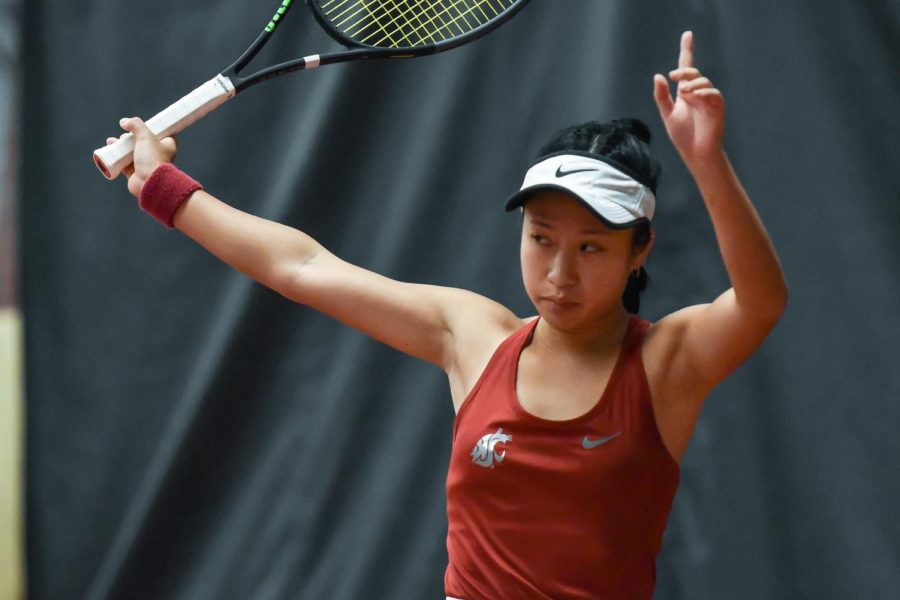 Savanna Ly-Nguyen celebrates a point during a doubles match against Idaho, Saturday, Jan. 29, at Hollingbery Fieldhouse.