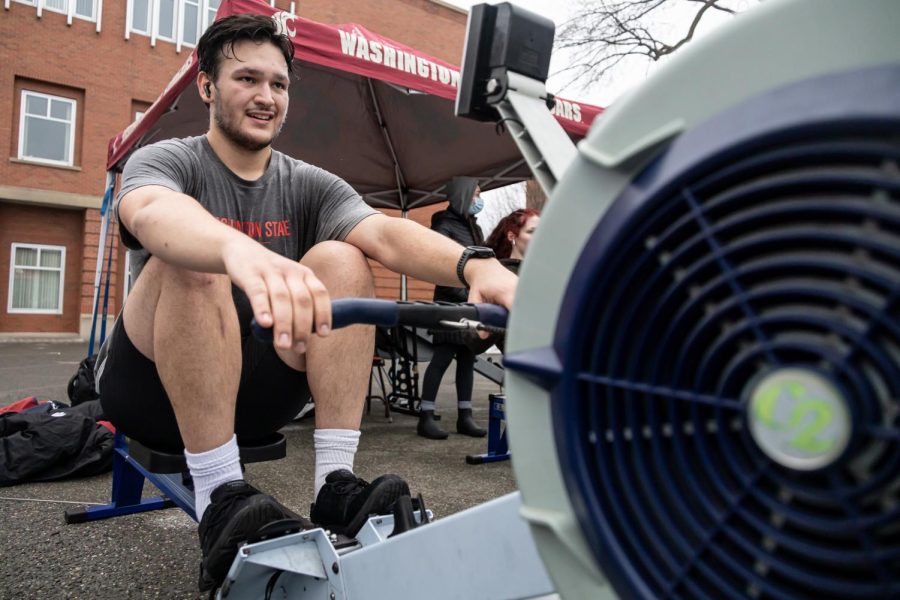 WSU freshman Aidan Simpson participates in the WSU Cougar Crew Erg-A-Thon to raise support for the Palouse-Clearwater Environmental Institute, Wednesday, Jan. 26, on Terrell Mall.