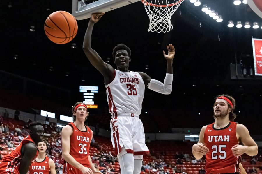 WSU forward Mouhamed Gueye (35, white) watches the ball fly out-of-bounds during the first half of an NCAA collegiate basketball game against Utah, Wednesday, Jan. 26, in Beasley Coliseum.