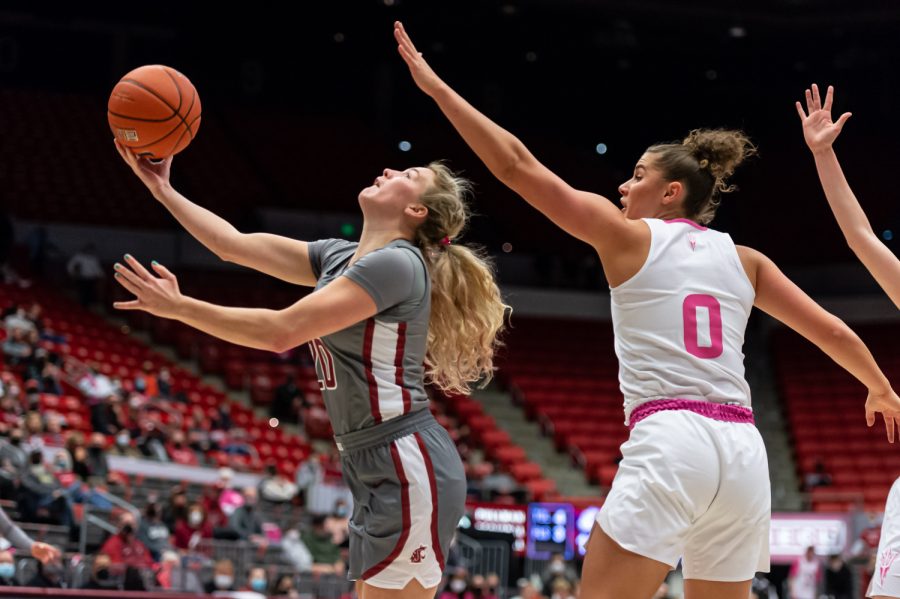 WSU guard Grace Sarver jumps for a layup during the first half of an NCAA college basketball game against Arizona State in Beasley Coliseum, Feb. 18.