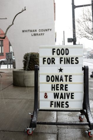 The Whitman County Library branch in Colfax already received several donations on the first day of the annual Food for Fines program, yesterday, Feb. 2, 2022 in Colfax, Washington. 