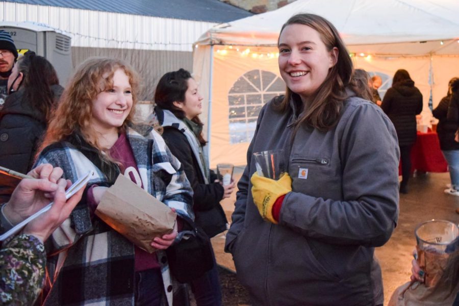 Alena Kinsey (left) and WSU doctoral student Charli Farris said they enjoyed having a night out as friends. Farris attended the event with her barley breeding and molecular genetics lab, which is part of the crop and soil science department.